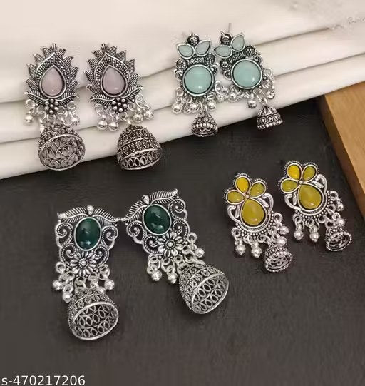 stunning oxidized silver jhumkas feature vibrant red, green, and pink hues