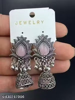stunning oxidized silver jhumkas feature vibrant red, green, and pink hues